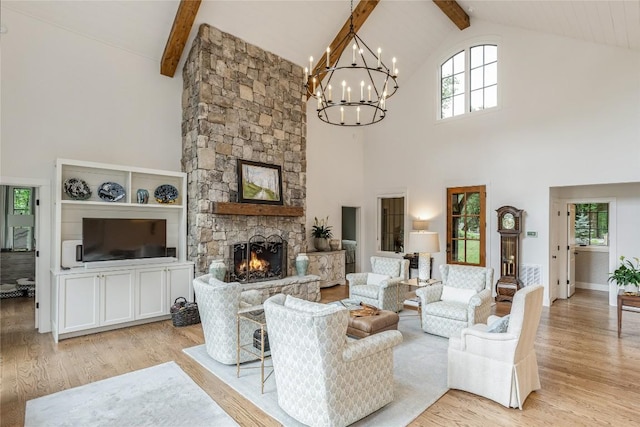 510 Boiling Springs Rd, Sapphire, NC 28774 - living room featuring high vaulted ceiling, beamed ceiling, a fireplace, light wood finished floors, and a chandelier