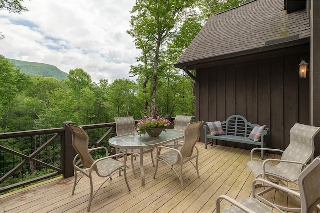 510 Boiling Springs Rd, Sapphire, NC 28774 - deck featuring outdoor dining space and a wooded view