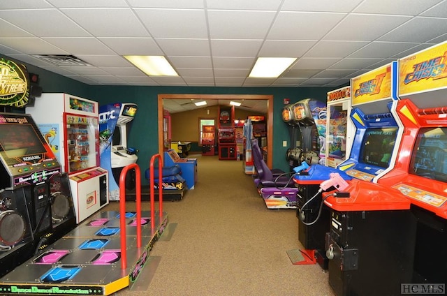 playroom with a drop ceiling and carpet flooring