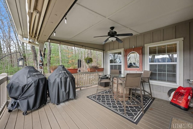 wooden deck with ceiling fan