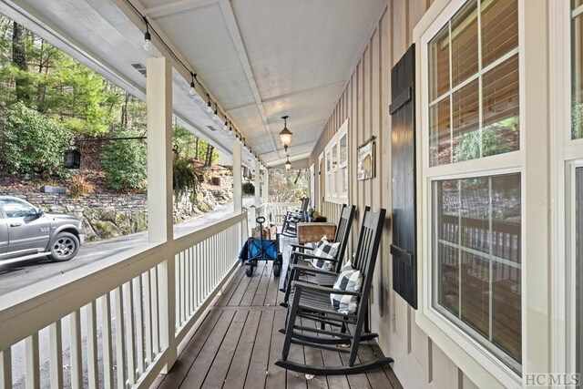 wooden terrace with covered porch