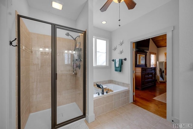 bathroom with separate shower and tub, ceiling fan, and tile patterned flooring