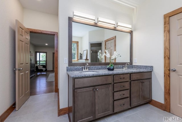 bathroom featuring tile patterned floors and vanity