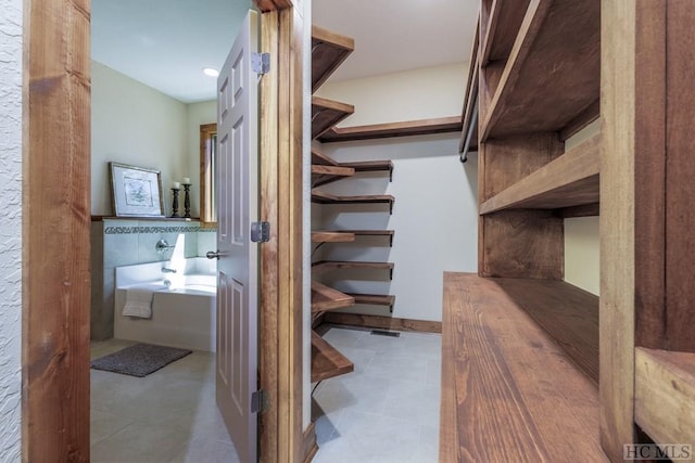 interior space featuring light tile patterned floors