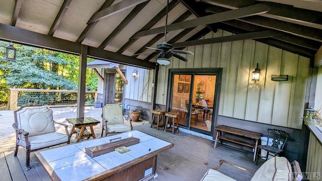 wooden deck featuring a gazebo and ceiling fan