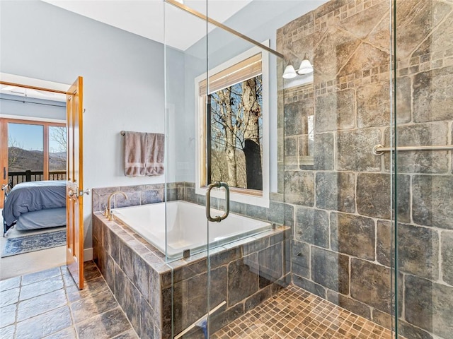 130 Cross Vine Dr, Tuckasegee, NC 28783 - ensuite bathroom with a stall shower, stone finish flooring, a garden tub, and ensuite bath