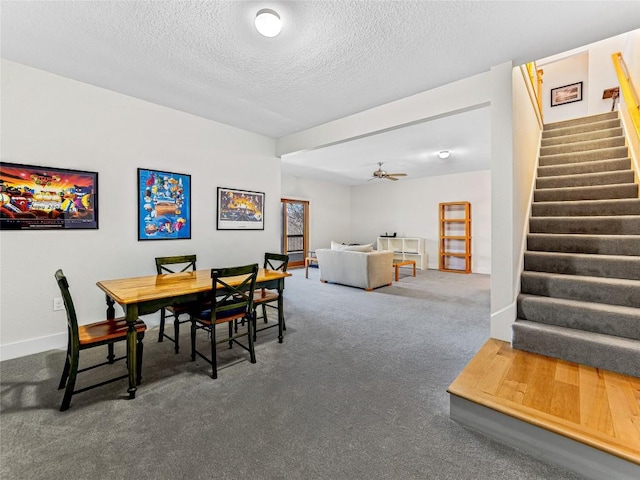 130 Cross Vine Dr, Tuckasegee, NC 28783 - dining space featuring stairway, carpet flooring, ceiling fan, a textured ceiling, and baseboards