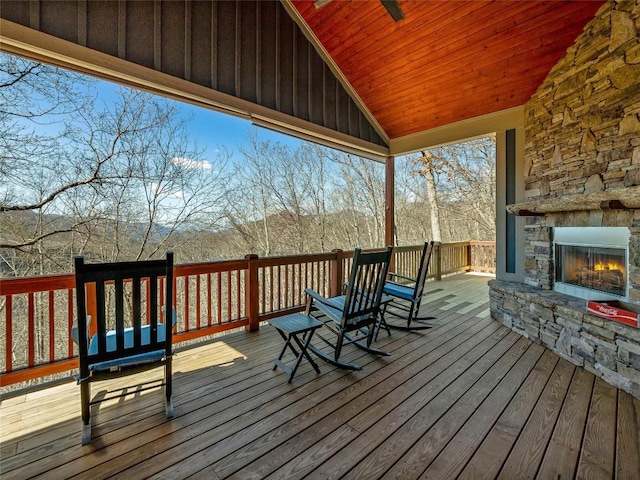 130 Cross Vine Dr, Tuckasegee, NC 28783 - wooden terrace featuring an outdoor stone fireplace