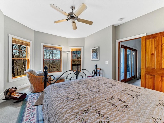 130 Cross Vine Dr, Tuckasegee, NC 28783 - carpeted bedroom featuring access to outside and ceiling fan