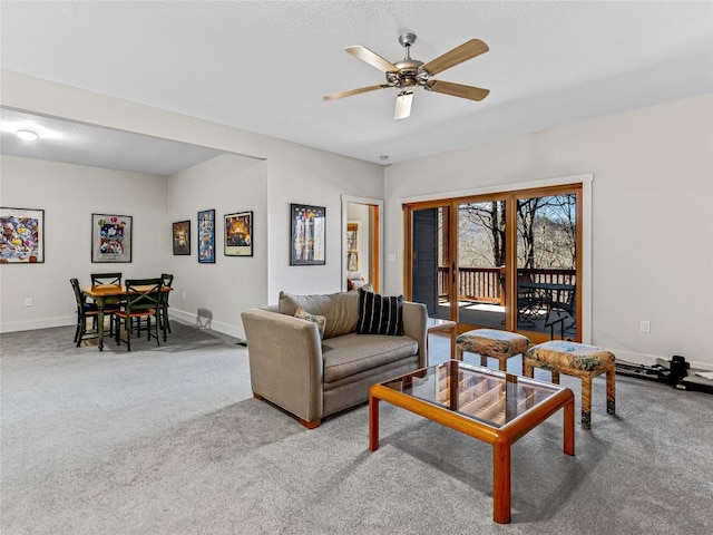 130 Cross Vine Dr, Tuckasegee, NC 28783 - carpeted living area with a ceiling fan and baseboards