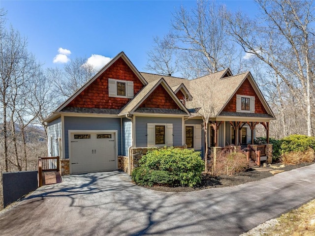 130 Cross Vine Dr, Tuckasegee, NC 28783 - craftsman inspired home featuring roof with shingles, a porch, a garage, stone siding, and driveway