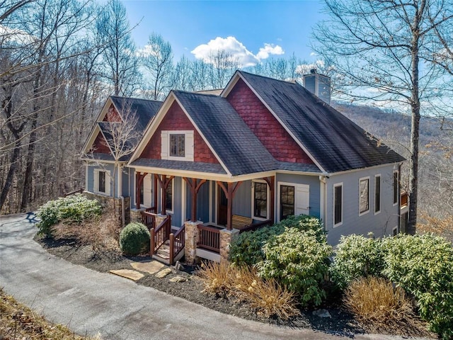 130 Cross Vine Dr, Tuckasegee, NC 28783 - craftsman inspired home with a chimney, a porch, and roof with shingles