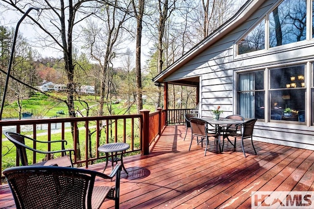 129 Cedar Creek Rd, Glenville, NC 28736 - deck with outdoor dining space