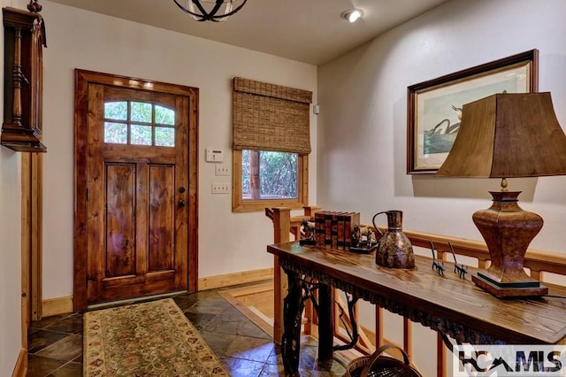 129 Cedar Creek Rd, Glenville, NC 28736 - foyer featuring dark stone finish floors and recessed lighting