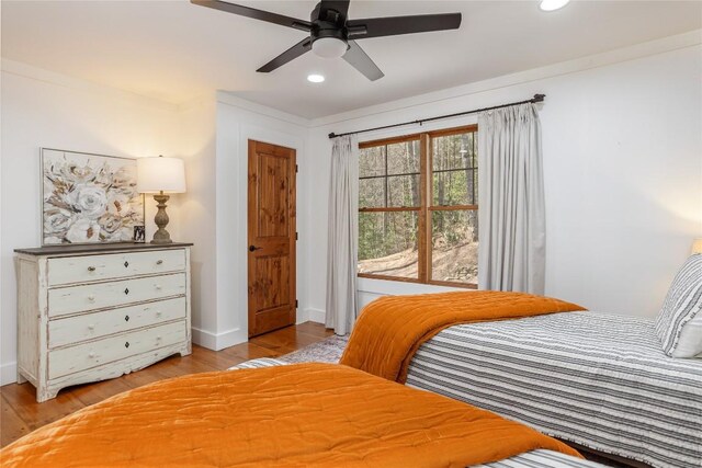 1034 E Rochester Dr, Cashiers, NC 28717 - bedroom with light wood-type flooring, recessed lighting, baseboards, and ceiling fan