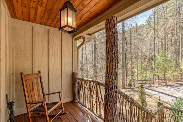 1034 E Rochester Dr, Cashiers, NC 28717 - wooden deck featuring a wooded view