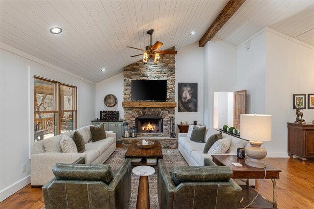 1034 E Rochester Dr, Cashiers, NC 28717 - living area with a ceiling fan, wood finished floors, baseboards, a stone fireplace, and recessed lighting