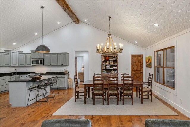 1034 E Rochester Dr, Cashiers, NC 28717 - dining area featuring a chandelier, light wood finished floors, recessed lighting, high vaulted ceiling, and baseboards