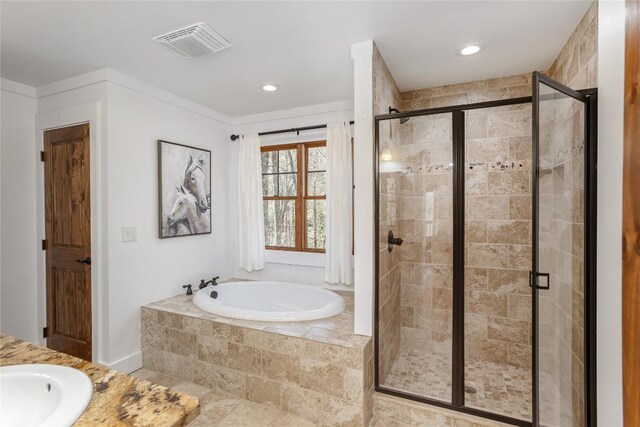 1034 E Rochester Dr, Cashiers, NC 28717 - bathroom with a garden tub, a stall shower, vanity, and recessed lighting
