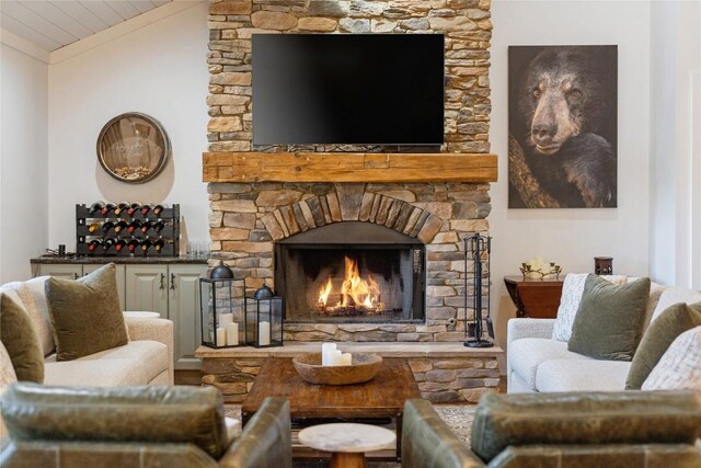 1034 E Rochester Dr, Cashiers, NC 28717 - living room featuring lofted ceiling and a fireplace
