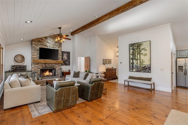 1034 E Rochester Dr, Cashiers, NC 28717 - living area with ceiling fan, hardwood / wood-style flooring, a stone fireplace, and baseboards