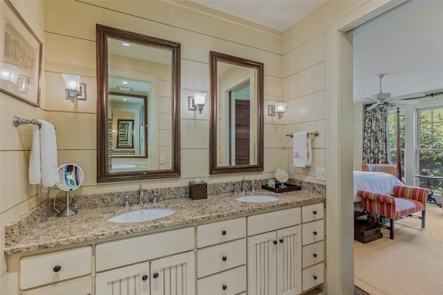 131 Big Creek Ln, Highlands, NC 28741 - bathroom featuring double vanity, connected bathroom, and a ceiling fan