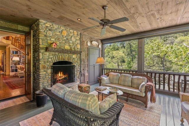 131 Big Creek Ln, Highlands, NC 28741 - sunroom with ceiling fan and an outdoor living space with a fireplace