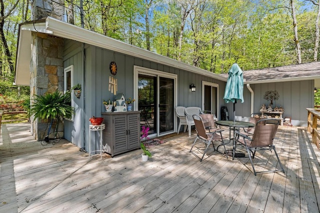 deck featuring outdoor dining area