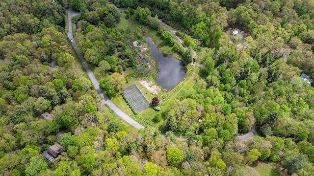 aerial view of property and surrounding area with a large body of water