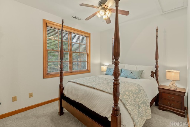 bedroom featuring light colored carpet and ceiling fan