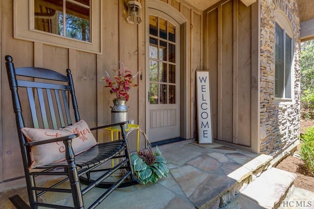 entrance to property featuring a porch