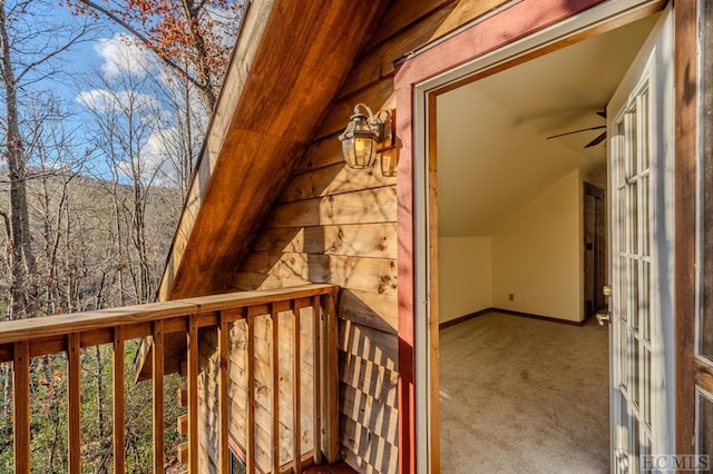 exterior space featuring ceiling fan