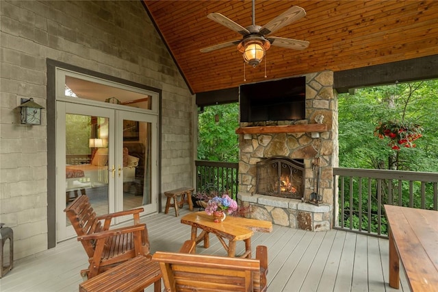614 Fairway Dr, Lake Toxaway, NC 28747 - sunroom featuring an outdoor stone fireplace, lofted ceiling, ceiling fan, and french doors