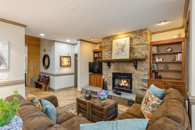 614 Fairway Dr, Lake Toxaway, NC 28747 - living room featuring ornamental molding, light wood-style floors, a stone fireplace, and recessed lighting
