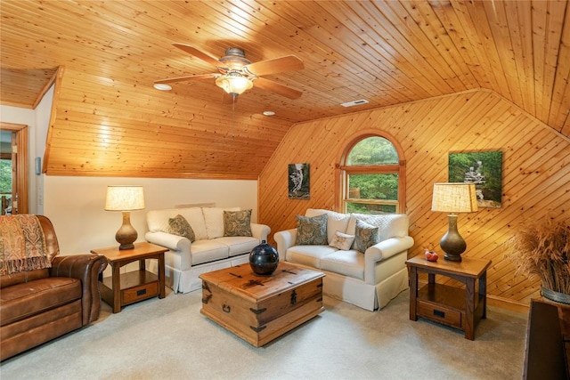614 Fairway Dr, Lake Toxaway, NC 28747 - living room with lofted ceiling, wood ceiling, a ceiling fan, carpet floors, and wood walls