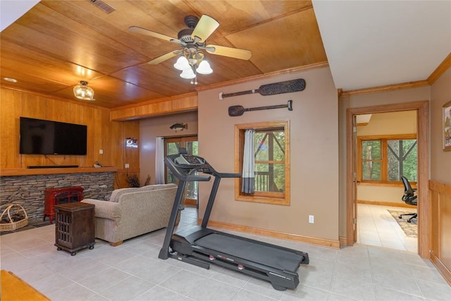 614 Fairway Dr, Lake Toxaway, NC 28747 - workout area featuring ornamental molding, healthy amount of natural light, wooden ceiling, light tile patterned floors, and wooden walls