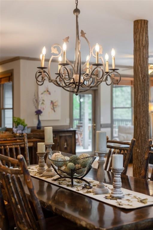 614 Fairway Dr, Lake Toxaway, NC 28747 - dining area featuring a chandelier and ornamental molding