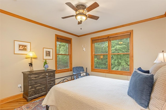 614 Fairway Dr, Lake Toxaway, NC 28747 - bedroom featuring wood finished floors, crown molding, and ceiling fan