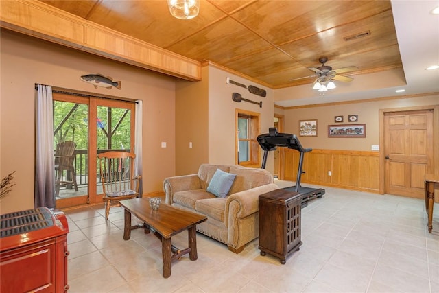 614 Fairway Dr, Lake Toxaway, NC 28747 - living area with wooden ceiling, a wainscoted wall, ceiling fan, ornamental molding, and light tile patterned floors