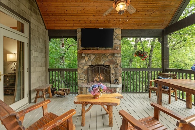 614 Fairway Dr, Lake Toxaway, NC 28747 - wooden terrace featuring an outdoor stone fireplace and ceiling fan