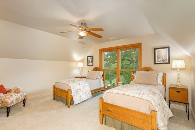 614 Fairway Dr, Lake Toxaway, NC 28747 - bedroom with vaulted ceiling, light colored carpet, and a ceiling fan
