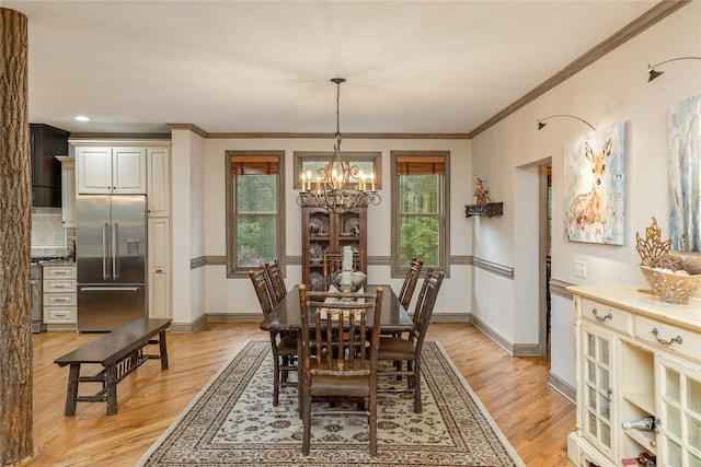614 Fairway Dr, Lake Toxaway, NC 28747 - dining room featuring light wood finished floors, a chandelier, and ornamental molding