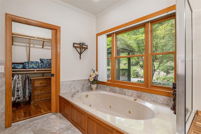 614 Fairway Dr, Lake Toxaway, NC 28747 - full bath with a tub with jets, crown molding, and a walk in closet