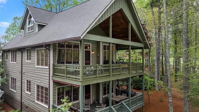 56 First Tee Trl B/Upper, B/Upper Cashiers, NC 28717 - back of property with board and batten siding, a deck, and a shingled roof