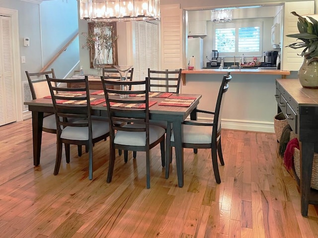 704 Highlands Mountain Club Rd Unit 704, Highlands, NC 28741 - dining space featuring a chandelier and light wood finished floors