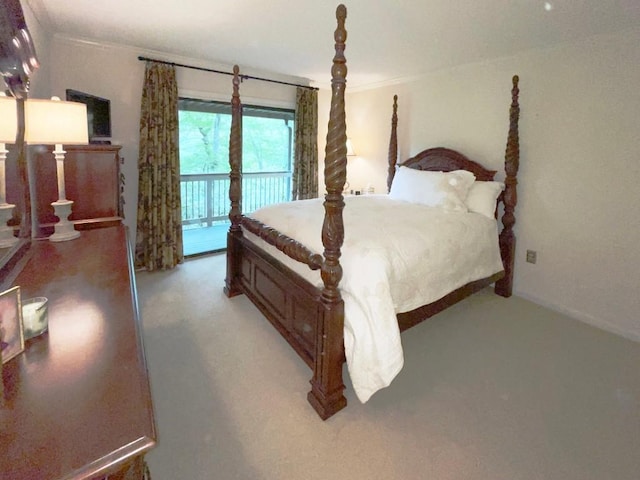 704 Highlands Mountain Club Rd Unit 704, Highlands, NC 28741 - bedroom with light colored carpet, access to exterior, and crown molding