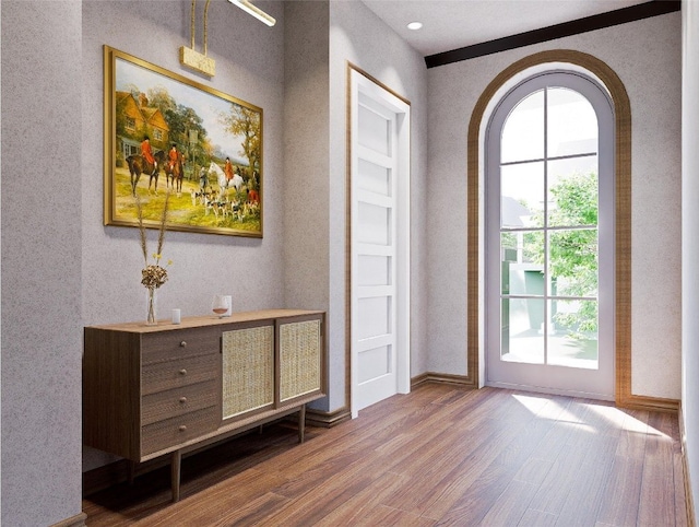 25 Hemlock Rdg, Highlands, NC 28741 - foyer entrance featuring wood finished floors, arched walkways, and a textured wall