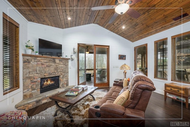 living room with lofted ceiling, wooden ceiling, hardwood / wood-style flooring, ceiling fan, and a fireplace