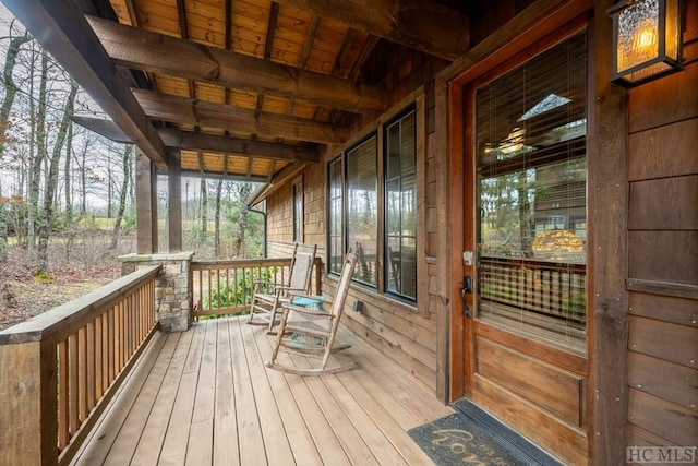 wooden deck featuring a porch