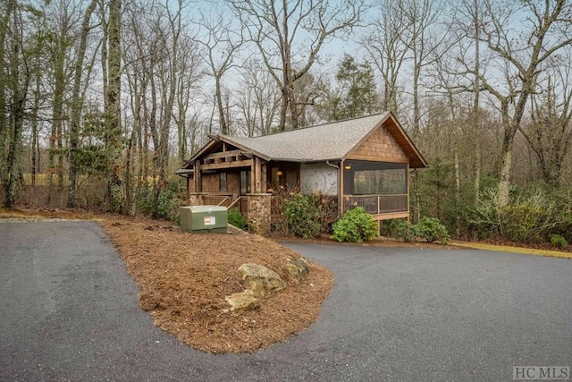 craftsman-style house with a sunroom